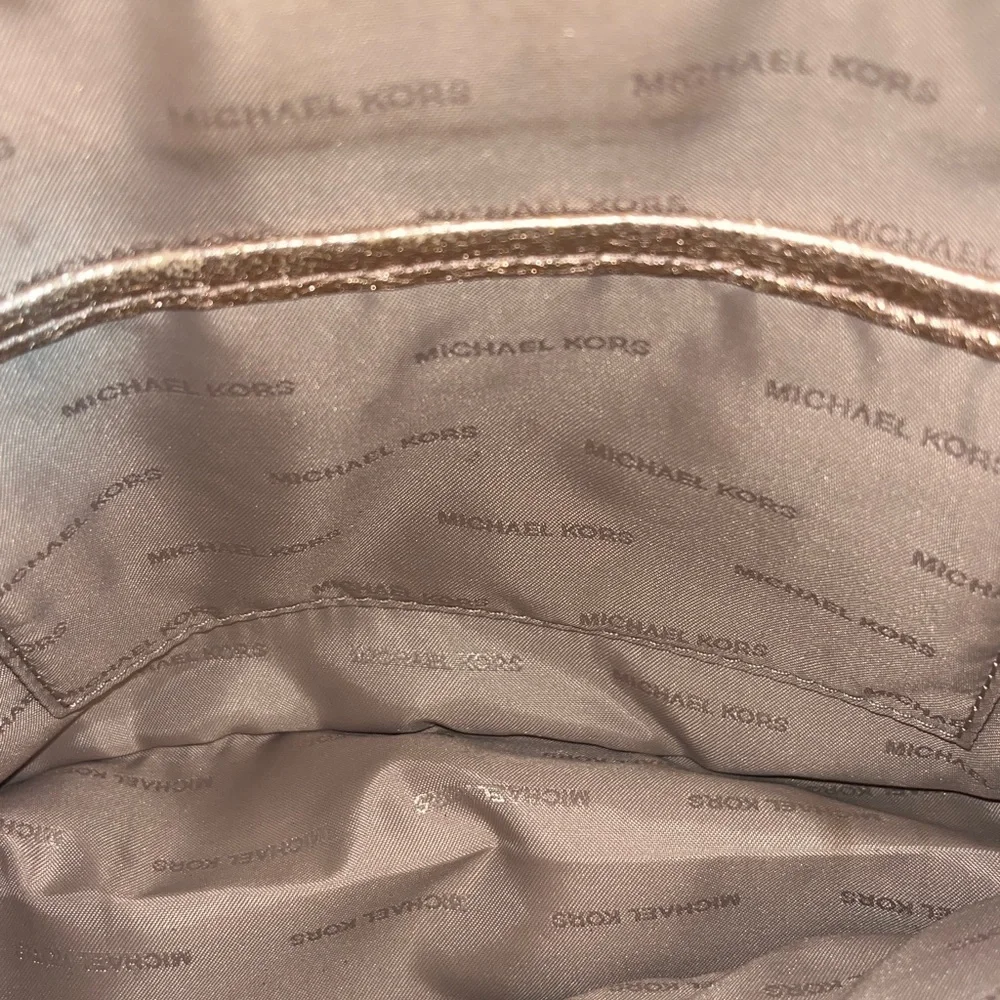 NWT Michael Kors metallic rose gold dome leather crossbody bag